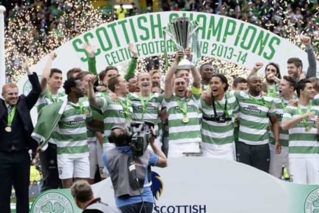 Celtic lift the SPFL Premiership trophy. Picture: SNS
