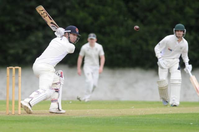 Henry Edwards hits out for Grange during the Edinburgh clubs victory over Aberdeenshire at Raeburn Place. Picture: Neil Hanna
