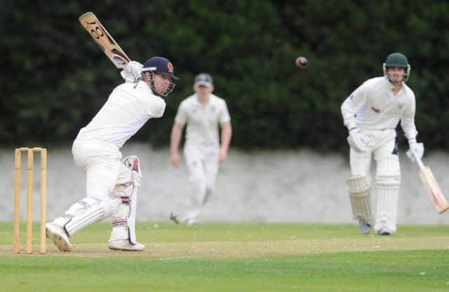 Henry Edwards hits out for Grange during the Edinburgh clubs victory over Aberdeenshire at Raeburn Place. Picture: Neil Hanna