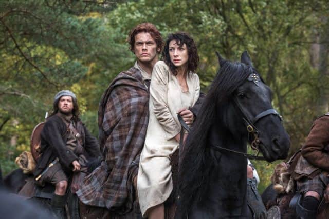 Caitriona Balfe stars as Claire Randall, with Sam Heughan as Jamie Fraser, in a scene from Outlander. Picture: AP