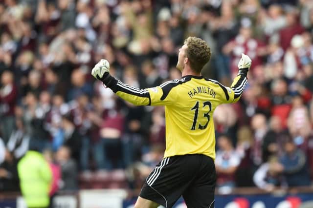Hearts youngster Jack Hamilton celebrates at the final whistle. Picture: SNS