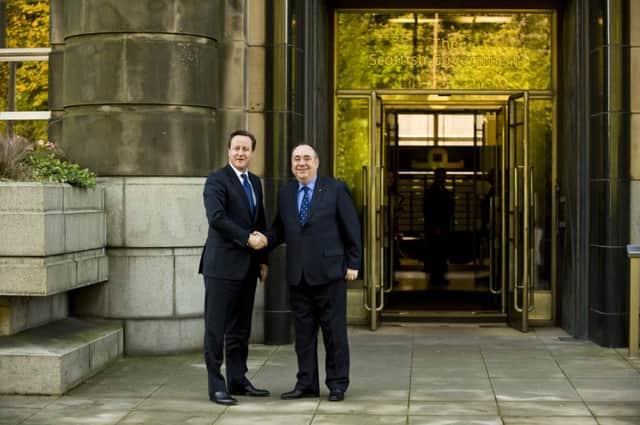 Alex Salmond and David Cameron  at St Andrew's House following the signing of the St Andrews agreement. Picture: TSPL