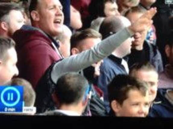 The Hearts supporter has been charged