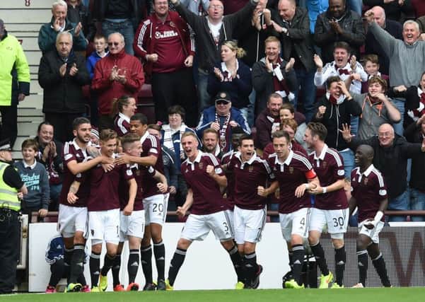 Hearts celebrate their opening goal in the Edinburgh derby. Picture: SNS