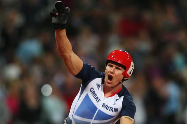 David Weir celebrates his gold in the mens 5,000m  T54 in the London 2012 Paralympics. Picture: Getty