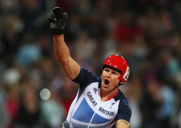David Weir celebrates his gold in the mens 5,000m  T54 in the London 2012 Paralympics. Picture: Getty