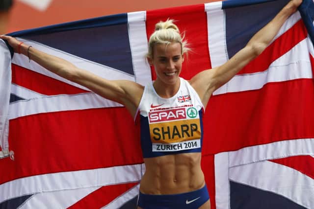 Lynsey Sharp celebrates her silver medal in the European 800 metres final, one of four Scottish successes in Zurich. Picture: Getty
