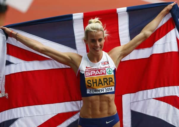Lynsey Sharp celebrates her silver medal in the European 800 metres final, one of four Scottish successes in Zurich. Picture: Getty