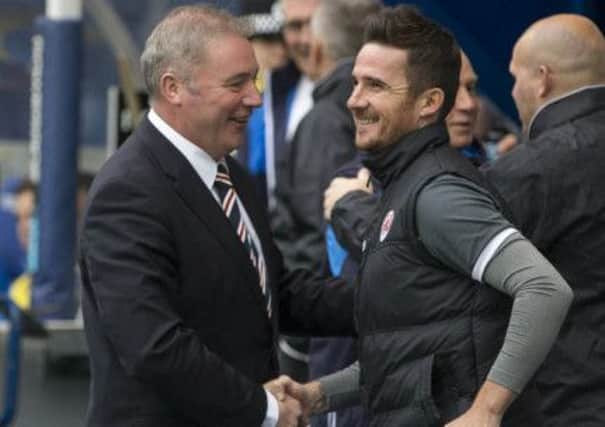 Ally McCoist and Barry Ferguson chat before the game. Picture: PA