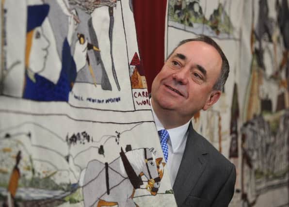 First Minister Alex Salmond with  the Great Tapestry of Scotland. Picture: JP