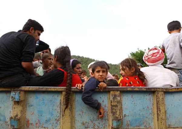 Some of the many thousands of Yezidis fleeing from Islamic State militants in northern Iraq. Independence could affect the amount of aid being sent to such places, according to a Labour MSP. Picture: Getty