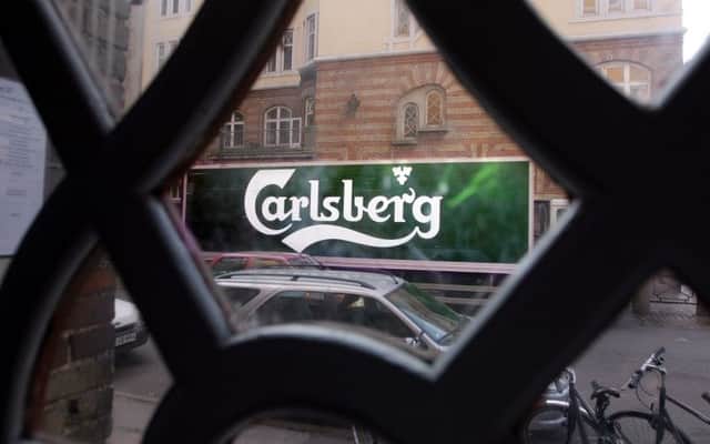 Carlsberg reported that geopolitical tensions with Russia reduced demand in the country. Picture: AP