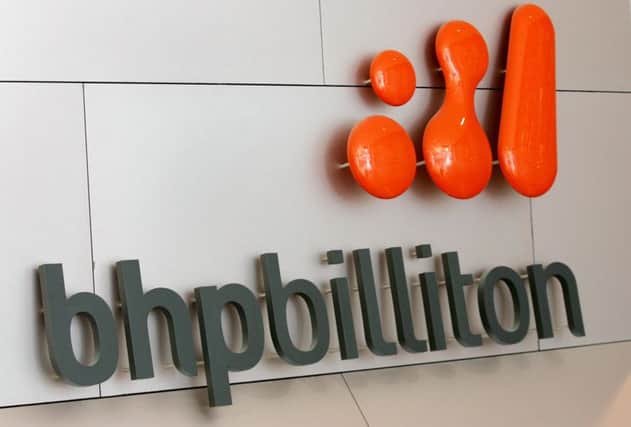 BHP Billiton will focus on demerging businesses worth around $16bn. Picture: AFP