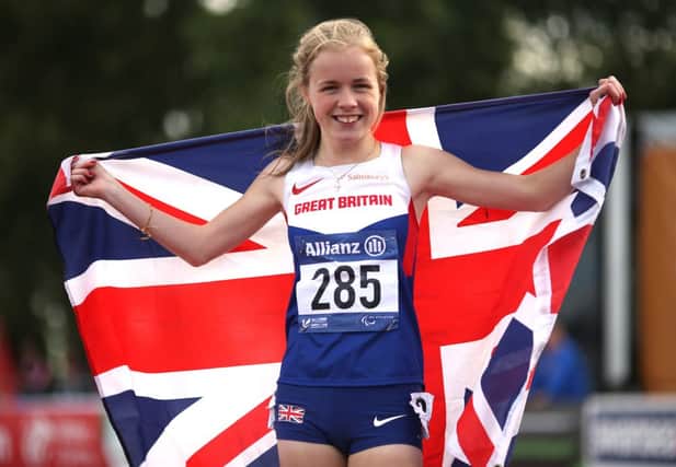 Maria Lyle, 14, celebrates her gold medal in the T35 100m at the  IPC Athletics European Championships in Swansea. Picture: Getty Images