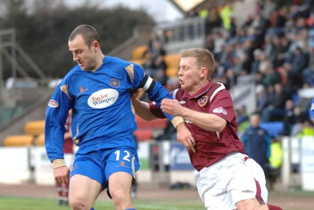 Dave Mackay, left, is now free to play for St Johnstone after winning his red card appeal. Picture: David Lamb