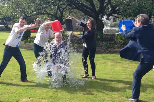 Alistair Darling taking part in the ice bucket challenge after he was nominated by actor James McAvoy. Picture: PA