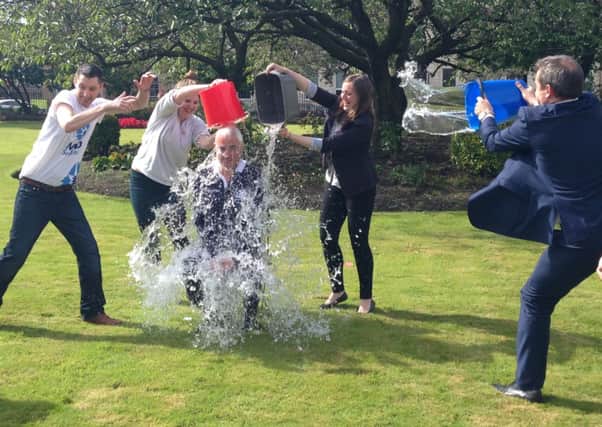 Alistair Darling taking part in the ice bucket challenge after he was nominated by actor James McAvoy. Picture: PA