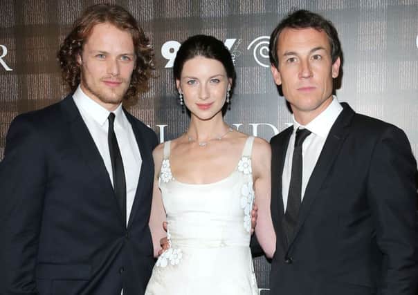 Outlander stars Sam Heughan, Caitriona Balfe and Tobias Menzies. Picture: Getty Images