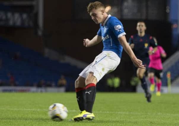 Rangers' Lewis Macleod scores side sixth goal during the Petrofac Training Cup Second Round match at Ibrox Stadium. Picture: PA