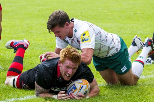 Roddy Grant goes over the line for a try to Edinburgh. Picture: SNS