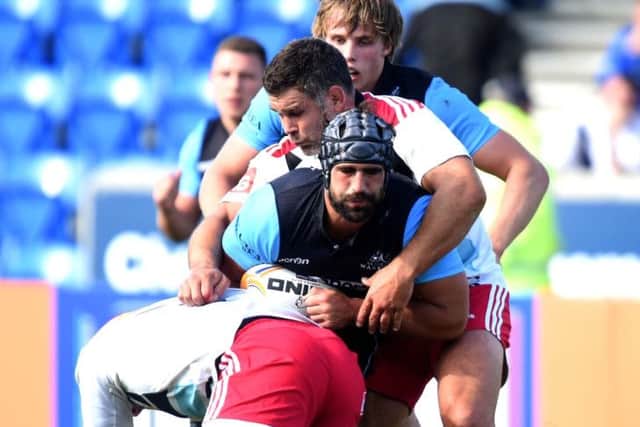 Harlequins' Joe Gray (bottom) and Nick Easter (2nd top) challenge Glasgow Warriors' Josh Strauss. Picture: SNS