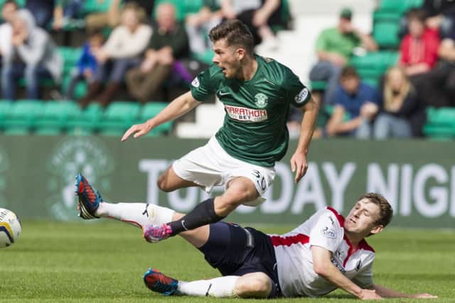 Falkirk's Blair Alston (right) slides in on Matthew Kennedy. Picture: SNS