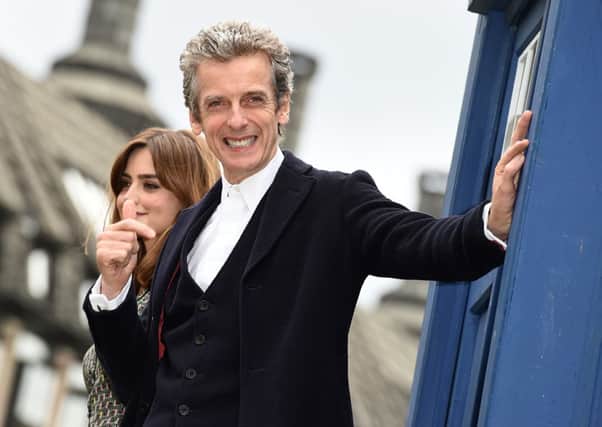 Peter Capaldi and Jenna Coleman pictured during a photocall prior to Capaldi's debut as Doctor Who. Picture: PA