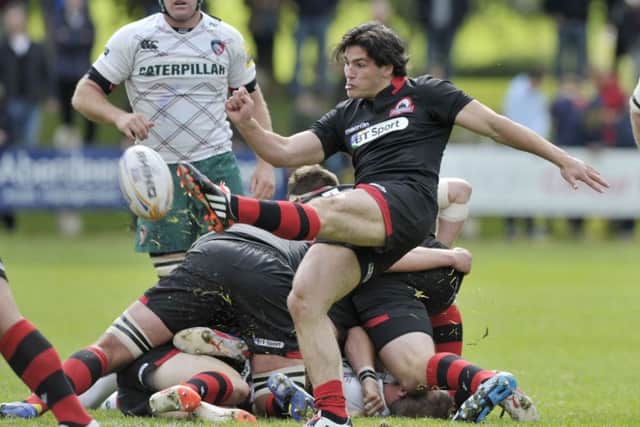 Edinburgh scrum half Sam Hidalgo-Clyne clears during his sides defeat in Melrose. Picture: Ian Rutherford