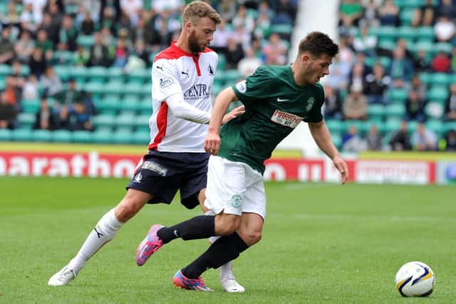 Rory Loy and Matthew Kennedy tussle for the ball at Easter Road. Picture: Lisa Ferguson