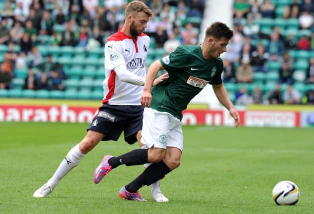 Rory Loy and Matthew Kennedy tussle for the ball at Easter Road. Picture: Lisa Ferguson