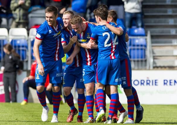 The Inverness players celebrate after an own goal by Celtic teenager Eoghan OConnell. Picture: SNS