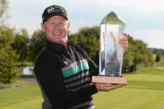 Jamie Donaldson poses with the trophy after claiming a two-stroke victory in Prague. Picture: Getty