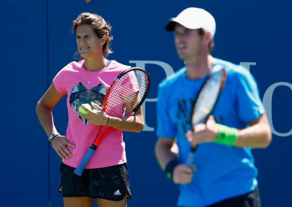 Andy Murray is watched by coach Amelie Mauresmo during practice for the US Open. Picture: Getty