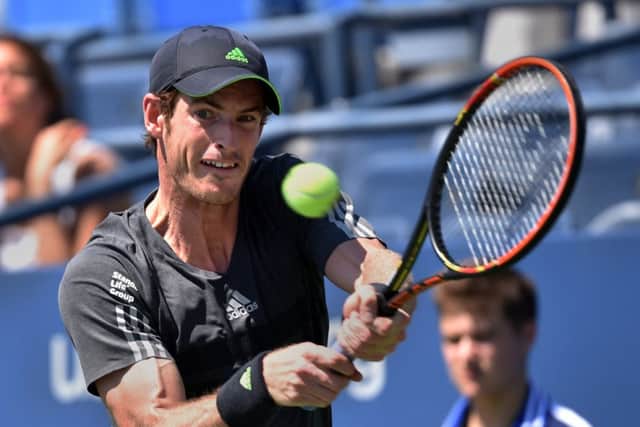 Andy Murray looked in a lot of pain yesterday as he defeated Robin Haase in the first round. Picture: Getty