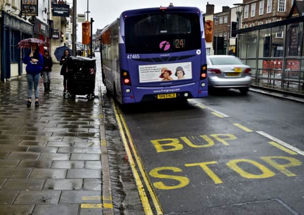Bup stop was painted on to the road surface in Bristol in large yellow lettering at the end of last week. Picture: PA