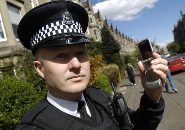 Police in Edinburgh are warning people about fraudsters who call up members of the public claiming to be from their bank. Picture: TSPL