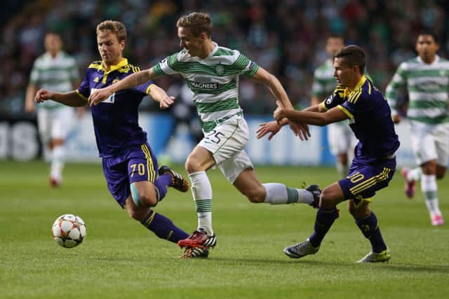 Stefan Johansen of Celtic goes between Ales Mertelj and Petar Stojanovic. Picture: Getty