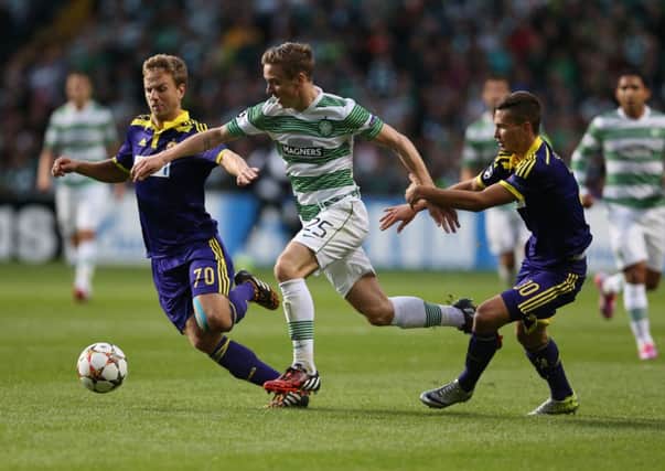 Stefan Johansen of Celtic goes between Ales Mertelj and Petar Stojanovic. Picture: Getty