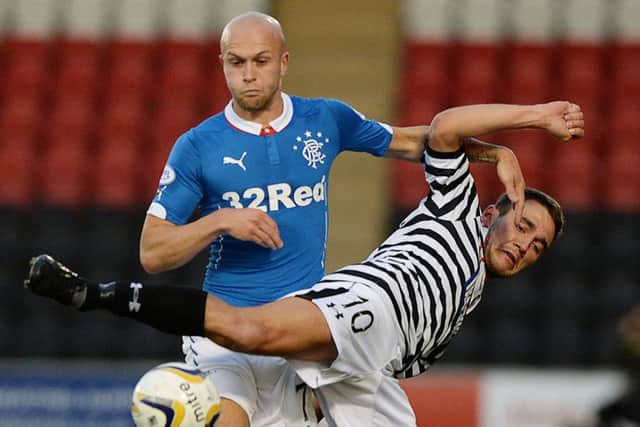 Rangers' Nicky Law battles it out with Shaun Fraser (right). Picture: SNS