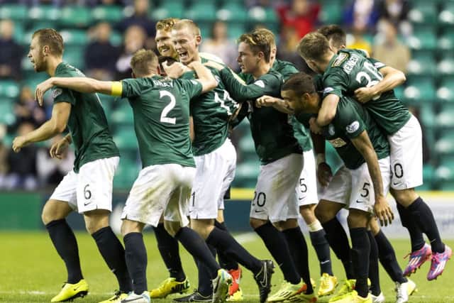 Sam Stanton (3rd left) is congratulated on his late winner. Picture: SNS