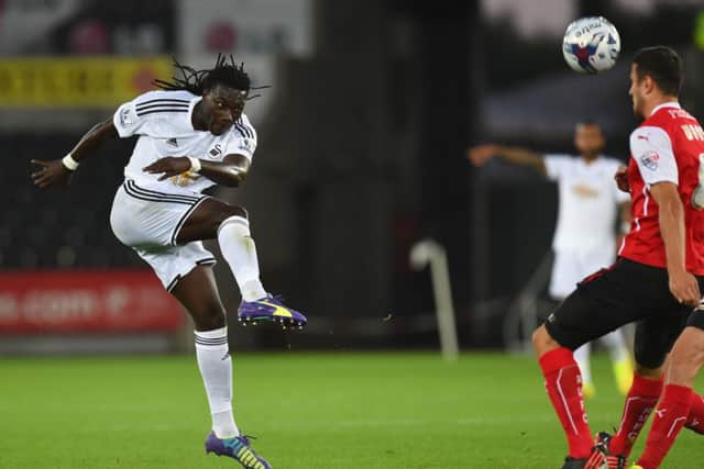 Bafetimbi Gomis gets in a shot at goal during the Capital One Cup match with Rotherham. Picture: Getty