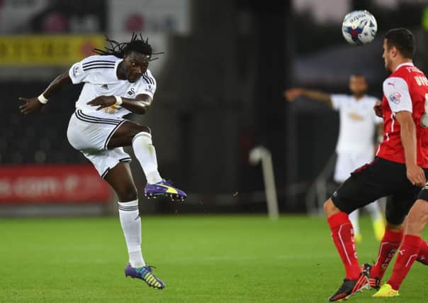 Bafetimbi Gomis gets in a shot at goal during the Capital One Cup  match with Rotherham. Picture: Getty