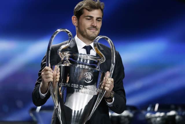 Real Madrid goalkeeper Iker Casillas poses with the trophy during yesterdays draw in Monte Carlo. Picture: Getty