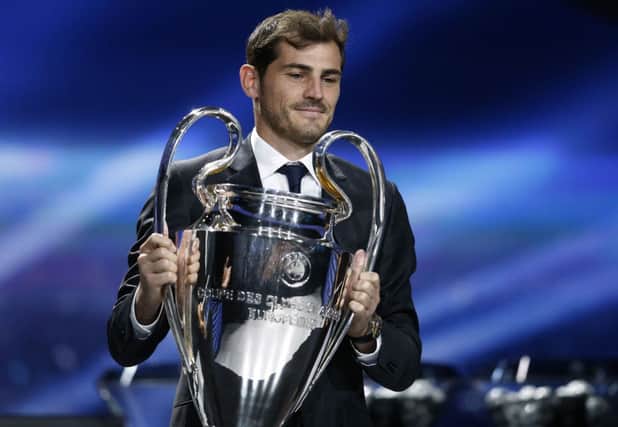 Real Madrid goalkeeper Iker Casillas poses with the trophy during yesterdays draw in Monte Carlo. Picture: Getty