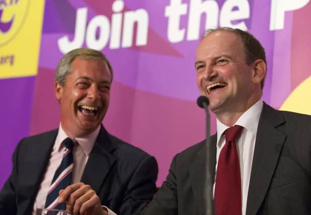 Douglas Carswell, right, has forced a by-election by defecting to Ukip. Picture: Getty