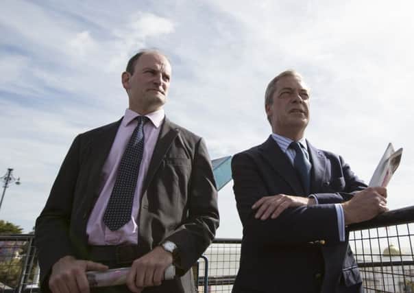 Nigel Farage and Douglas Carswell admire the seafront at Clacton-on-Sea. Picture: Getty