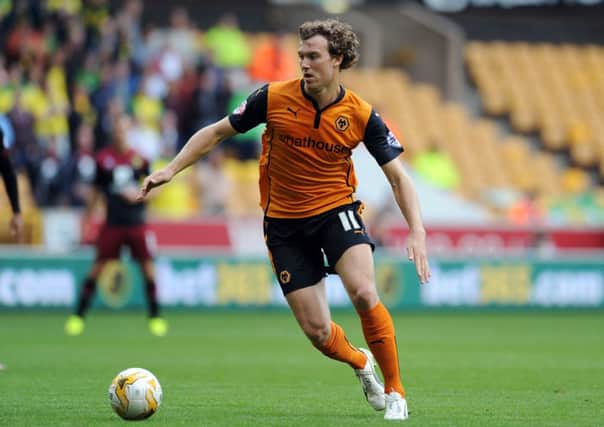 Kevin McDonald in full flow in the old gold of Wolves, main picture, and, above, in action for Burnley and Scotland under-21s in 2009. Picture: Getty