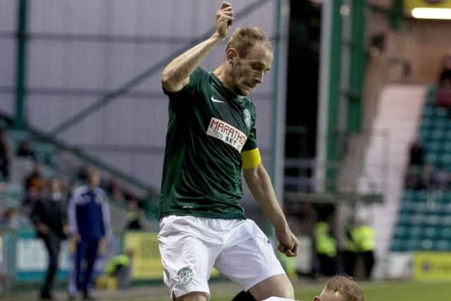 David Gray, left, believes Hibs League Cup win over Dumbarton is a sign of better times ahead. Picture: SNS