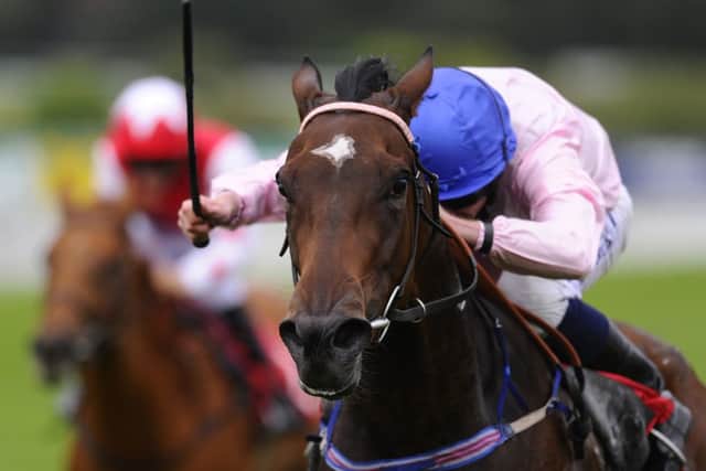 Ryan Moore and Brown Diamond on their  way to victory in the The Squire Furneaux Volvo Maiden Fillies Stakes at Sandown yesterday. Picture: Getty