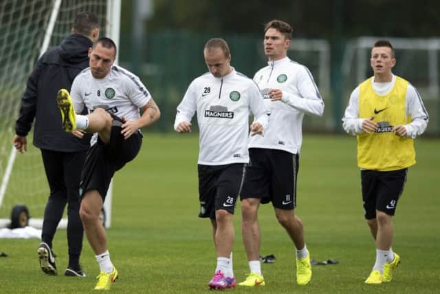 Celtic players, left to right, Scott Brown, Leigh Griffiths, Derk Boerrigter and Callum McGregor go through their routine during training at Lennoxtown yesterday in preparation for tomorrows Premiership match against Dundee at Dens Park. Picture: SNS